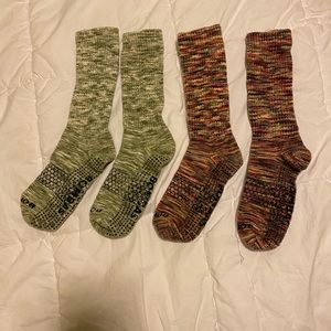 Two pairs of Bombas gripper socks slippers size large crew length.